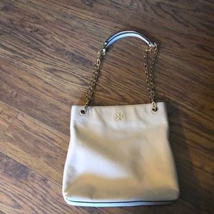 Tory burch pink bag! Super cute and well treated!